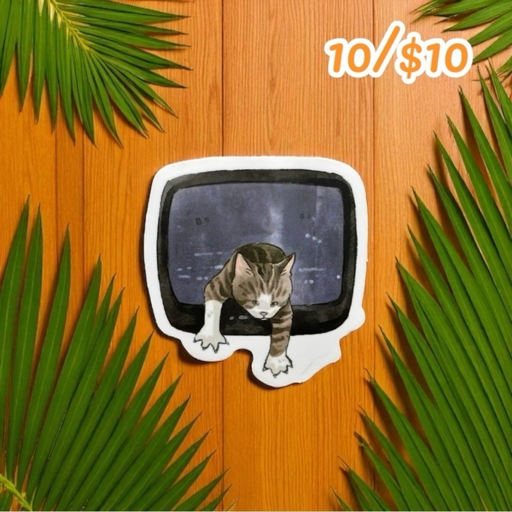Cat crawling out of TV sticker – 1.5”
